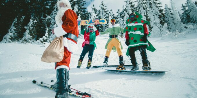 Santa Claus riding snowboard